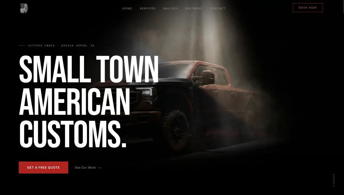 The Small Town American Customs homepage — a dark, cinematic hero for a veteran-owned vehicle-customization and detailing shop, with a dust-lit custom truck emerging from studio shadow.